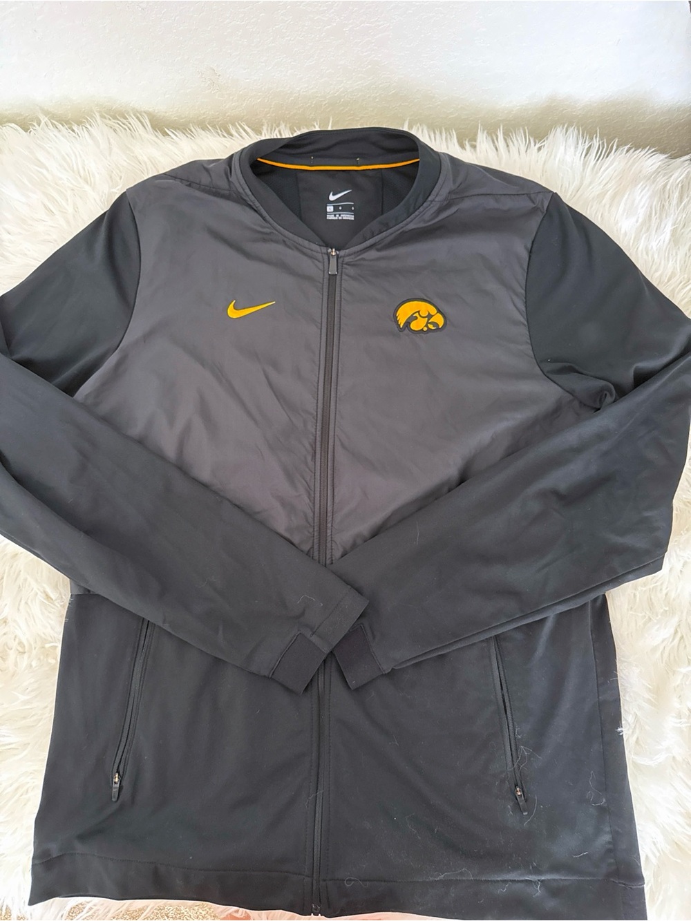 Nike Men’s Iowa Hawkey Black Jacket with Gold Logo